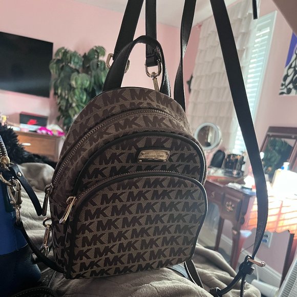 brown Michael Kors mini backpack